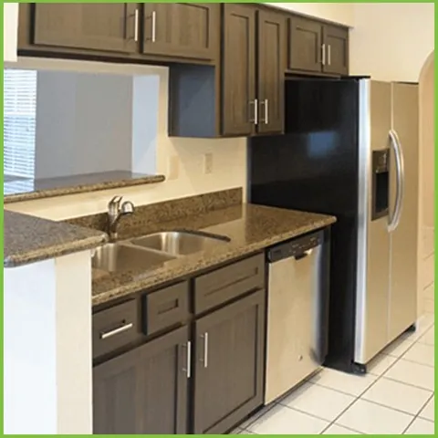 Same kitchen after cabinet refacing in Espresso Walnut