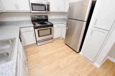 Flour kitchen refaced with a Qwikkit cabinet refacing kit