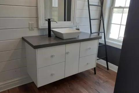 Flour Slab fronts on frameless bath cabinets refaced with a Qwikkit cabinet refacing kit